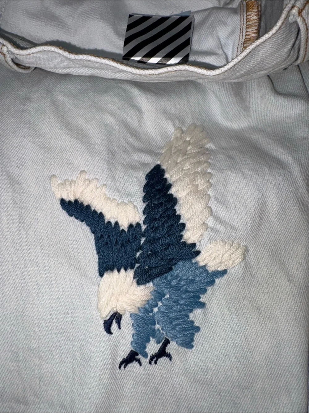Off-White Light Blue Denim Shorts with Embroidered Birds